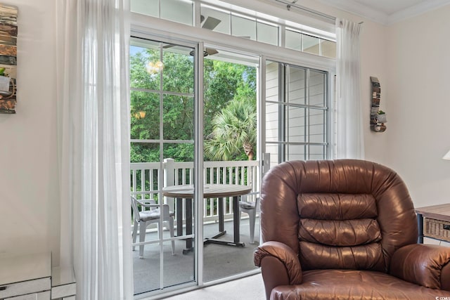 5750 Oyster Catcher Dr Unit 822, North Myrtle Beach, SC 29582 - living area featuring healthy amount of natural light and ornamental molding