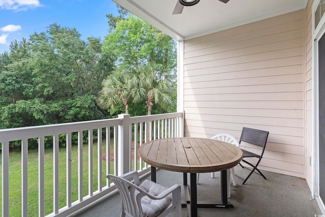 5750 Oyster Catcher Dr Unit 822, North Myrtle Beach, SC 29582 - balcony with a ceiling fan and outdoor dining space