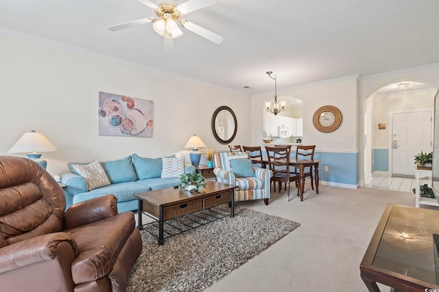 5750 Oyster Catcher Dr Unit 822, North Myrtle Beach, SC 29582 - living room with arched walkways, light colored carpet, ceiling fan, ornamental molding, and a chandelier