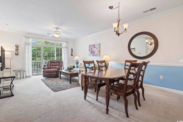 5750 Oyster Catcher Dr Unit 822, North Myrtle Beach, SC 29582 - dining room featuring light carpet, ornamental molding, ceiling fan, a textured ceiling, and a chandelier