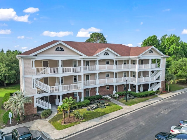 5750 Oyster Catcher Dr Unit 822, North Myrtle Beach, SC 29582 - view of building exterior featuring stairway