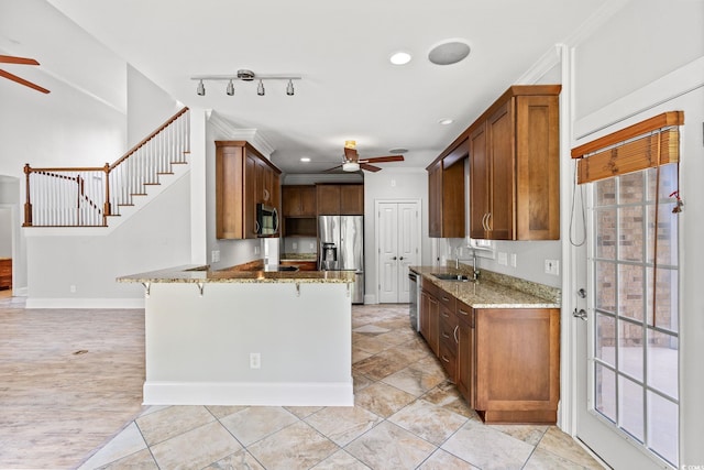 528 Chamberlin Rd, Myrtle Beach, SC 29588 - kitchen with a ceiling fan, appliances with stainless steel finishes, a sink, light stone counters, and recessed lighting