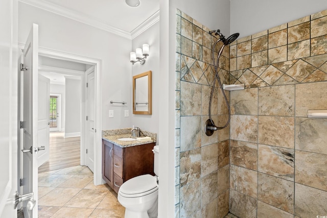 528 Chamberlin Rd, Myrtle Beach, SC 29588 - bathroom with a tile shower, crown molding, vanity, toilet, and tile patterned flooring