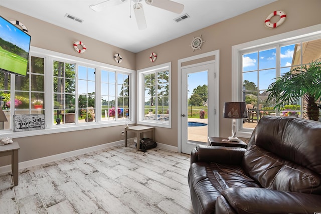 4826 Keel Ct, Myrtle Beach, SC 29579 - sunroom featuring healthy amount of natural light, wood finished floors, and a wooden deck