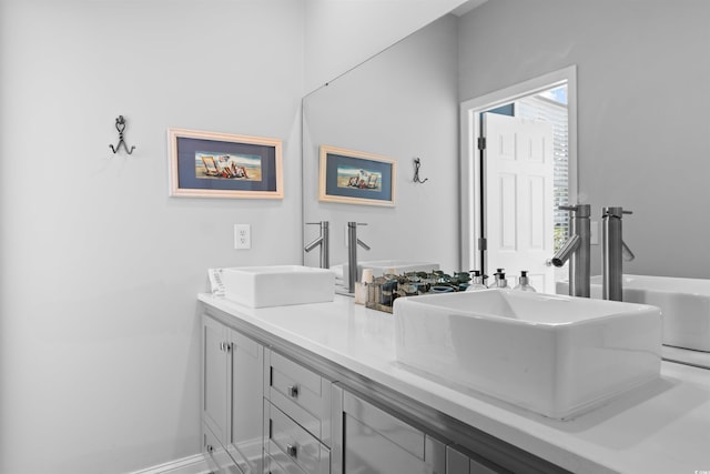 4826 Keel Ct, Myrtle Beach, SC 29579 - bathroom with double vanity and healthy amount of natural light