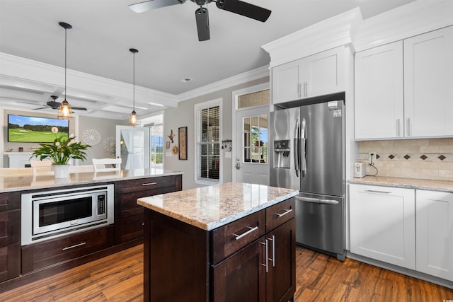 4826 Keel Ct, Myrtle Beach, SC 29579 - kitchen featuring stainless steel appliances, a ceiling fan, white cabinets, dark wood-style floors, and crown molding