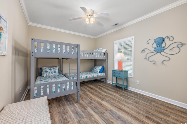 2405 Duffy St, North Myrtle Beach, SC 29582 - bedroom with ornamental molding, wood finished floors, and ceiling fan
