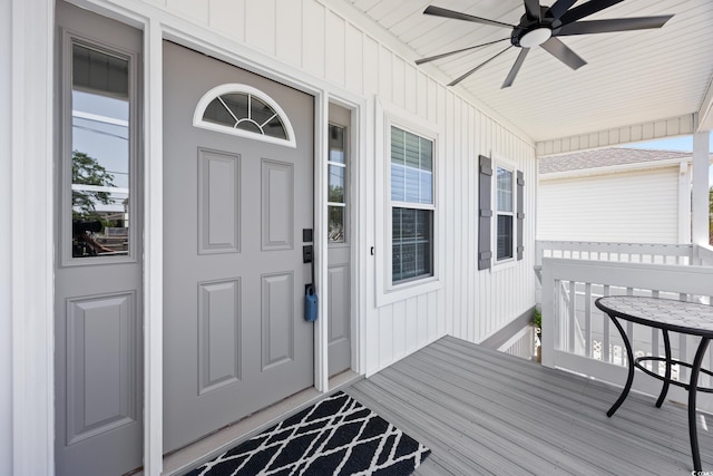 2405 Duffy St, North Myrtle Beach, SC 29582 - doorway to property featuring a porch, ceiling fan, and board and batten siding