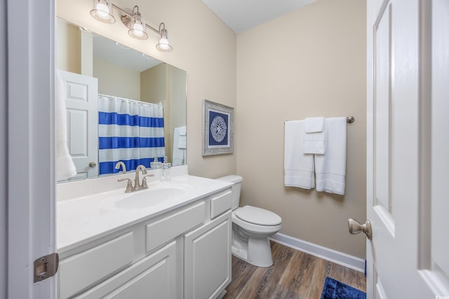 2405 Duffy St, North Myrtle Beach, SC 29582 - bathroom featuring wood finished floors, vanity, and a shower with curtain