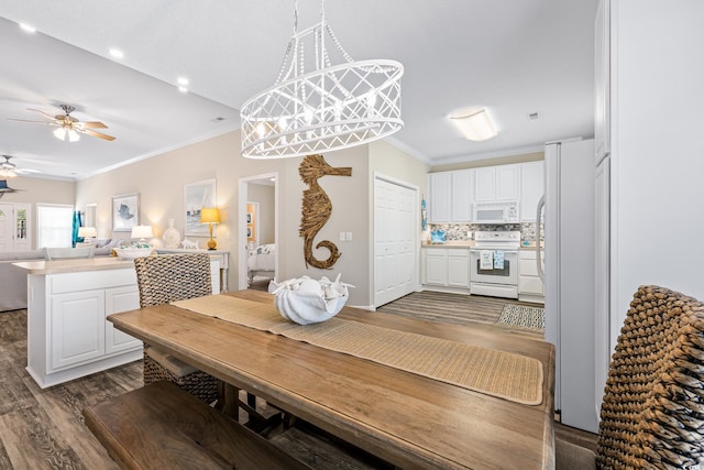 2405 Duffy St, North Myrtle Beach, SC 29582 - dining space with crown molding, dark wood-style flooring, and ceiling fan