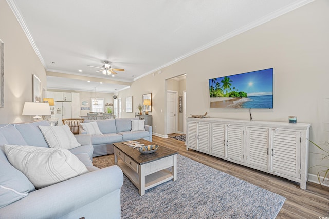 2405 Duffy St, North Myrtle Beach, SC 29582 - living room featuring wood finished floors, a ceiling fan, crown molding, and recessed lighting