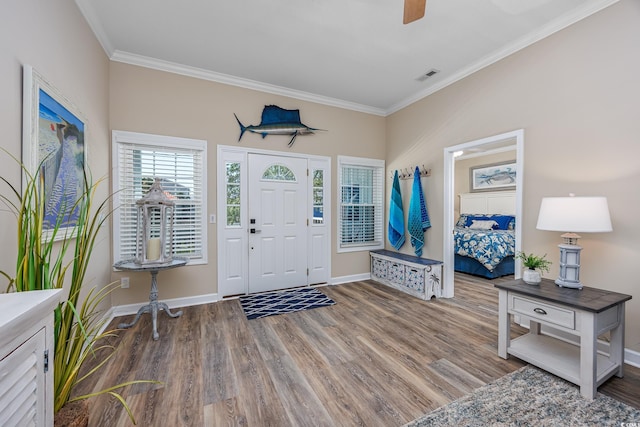 2405 Duffy St, North Myrtle Beach, SC 29582 - entryway with wood finished floors, crown molding, and ceiling fan
