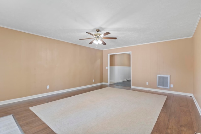 1043 S Main St, Aynor, SC 29511 - spare room featuring ceiling fan, wood finished floors, ornamental molding, and baseboards