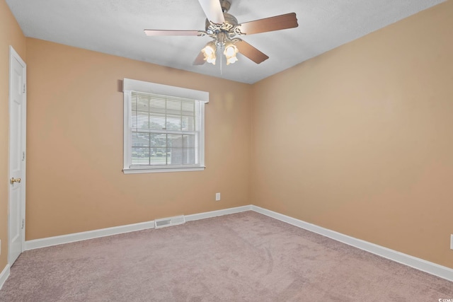 1043 S Main St, Aynor, SC 29511 - empty room with carpet floors, ceiling fan, and baseboards