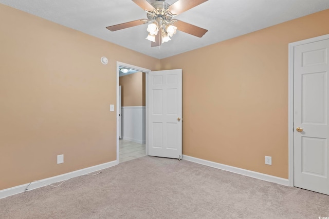 1043 S Main St, Aynor, SC 29511 - empty room with carpet, baseboards, and ceiling fan