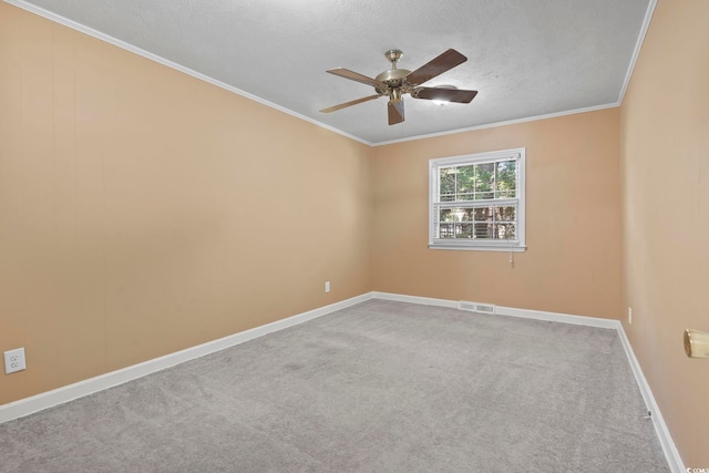 1043 S Main St, Aynor, SC 29511 - unfurnished room featuring a ceiling fan, carpet, crown molding, baseboards, and a textured ceiling