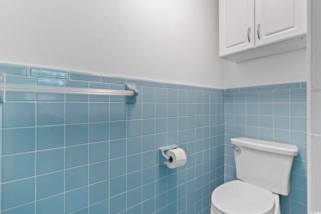 1043 S Main St, Aynor, SC 29511 - bathroom featuring toilet, tile walls, and a wainscoted wall