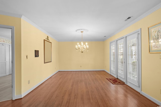 578 Circle Dr, Myrtle Beach, SC 29575 - unfurnished dining area with light wood-style floors, a chandelier, baseboards, and ornamental molding