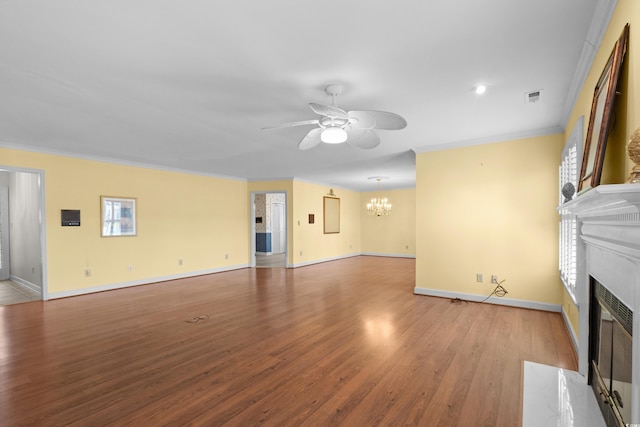 578 Circle Dr, Myrtle Beach, SC 29575 - unfurnished living room featuring a high end fireplace, a chandelier, a ceiling fan, crown molding, and baseboards