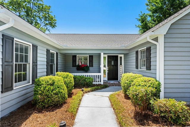 578 Circle Dr, Myrtle Beach, SC 29575 - property entrance with covered porch and roof with shingles