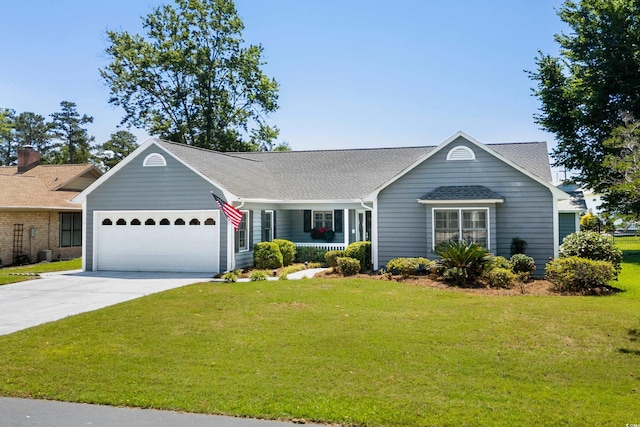 578 Circle Dr, Myrtle Beach, SC 29575 - single story home featuring an attached garage, a front yard, concrete driveway, and covered porch
