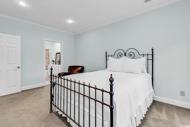 179 Golden Bear Dr Unit C4, Pawleys Island, SC 29585 - carpeted bedroom with baseboards, crown molding, recessed lighting, and ensuite bathroom