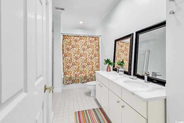 179 Golden Bear Dr Unit C4, Pawleys Island, SC 29585 - bathroom featuring double vanity, crown molding, tile patterned flooring, toilet, and shower / tub combo