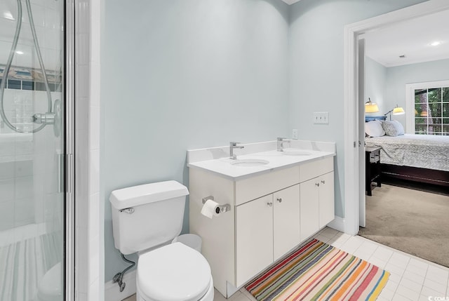179 Golden Bear Dr Unit C4, Pawleys Island, SC 29585 - ensuite bathroom with a shower stall, double vanity, tile patterned flooring, and toilet