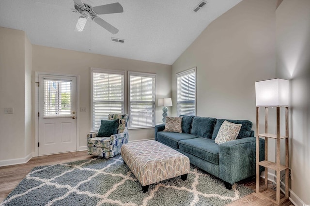 205 Threshing Way Unit 1052, Myrtle Beach, SC 29579 - living area with wood finished floors, ceiling fan, vaulted ceiling, and baseboards