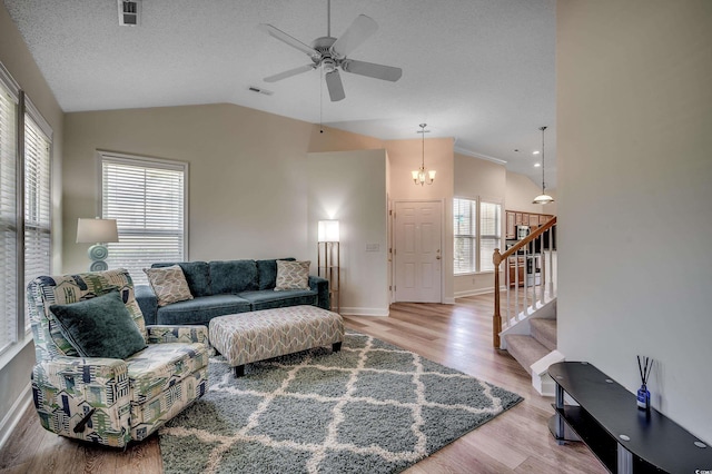 205 Threshing Way Unit 1052, Myrtle Beach, SC 29579 - living area featuring light wood finished floors, lofted ceiling, baseboards, a ceiling fan, and stairs