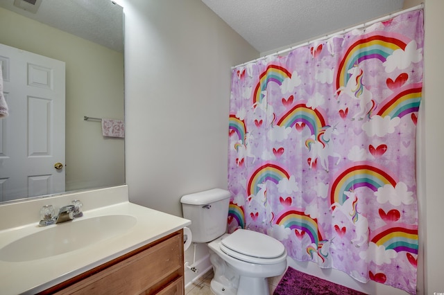 205 Threshing Way Unit 1052, Myrtle Beach, SC 29579 - bathroom with vanity, toilet, a textured ceiling, and a shower with curtain