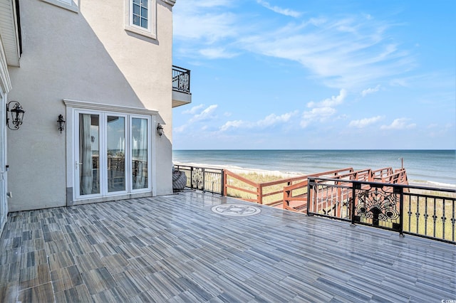 123 Pioneer Loop, Georgetown, SC 29440 - wooden terrace with view of water and beach