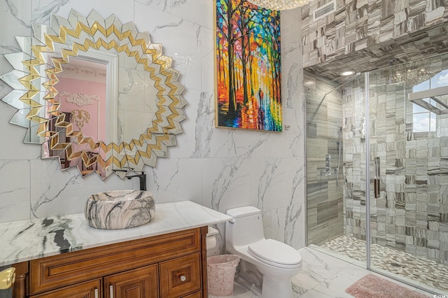 123 Pioneer Loop, Georgetown, SC 29440 - full bathroom with tile walls, marble finish flooring, vanity, toilet, and a stall shower