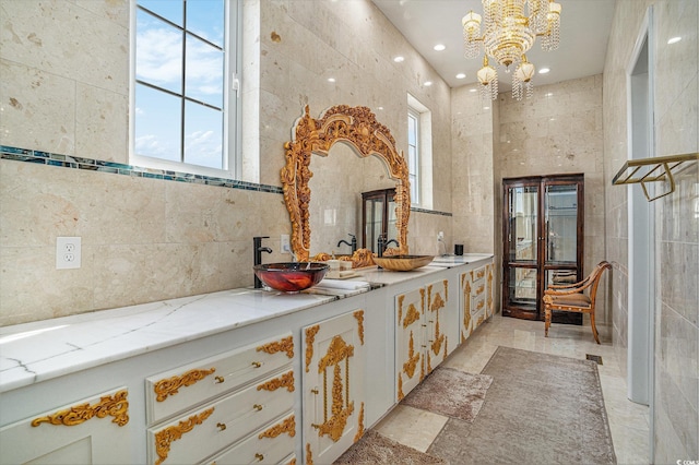 123 Pioneer Loop, Georgetown, SC 29440 - full bathroom featuring double vanity, a chandelier, tile walls, and recessed lighting