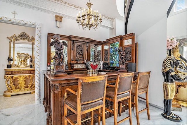 123 Pioneer Loop, Georgetown, SC 29440 - bar area with a chandelier and baseboards