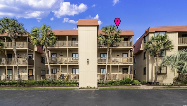 6309 N Ocean Blvd Unit 14E, North Myrtle Beach, SC 29582 - view of apartment building / complex with uncovered parking