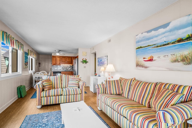 6309 N Ocean Blvd Unit 14E, North Myrtle Beach, SC 29582 - living room featuring light wood-style floors and a ceiling fan