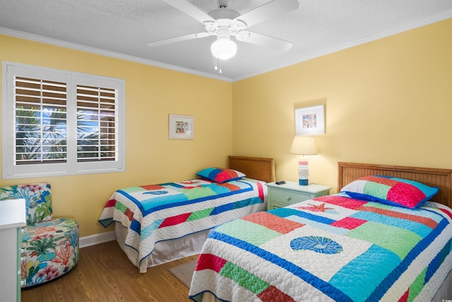 6309 N Ocean Blvd Unit 14E, North Myrtle Beach, SC 29582 - bedroom with wood finished floors, crown molding, baseboards, and a ceiling fan