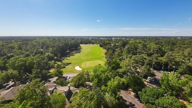 1221 Tidewater Dr Unit 2112, North Myrtle Beach, SC 29582 - aerial view of a local golf course and a heavily wooded area