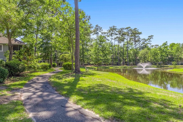 1221 Tidewater Dr Unit 2112, North Myrtle Beach, SC 29582 - view of community featuring a water view and a yard