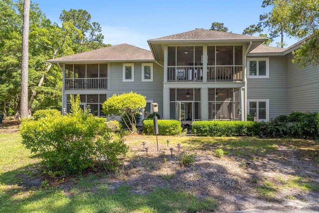 1221 Tidewater Dr Unit 2112, North Myrtle Beach, SC 29582 - rear view of house with a sunroom