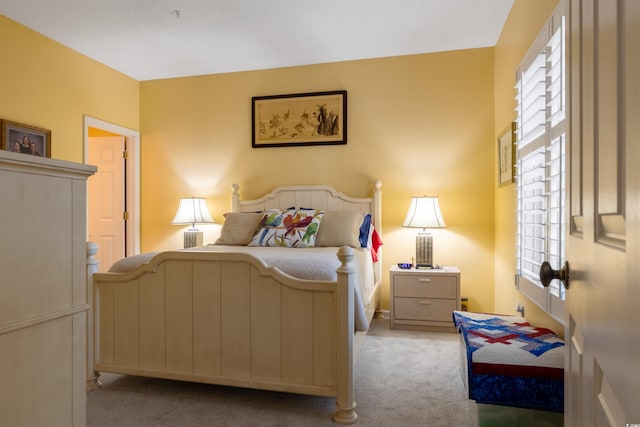 1221 Tidewater Dr Unit 2112, North Myrtle Beach, SC 29582 - bedroom with carpet floors and multiple windows