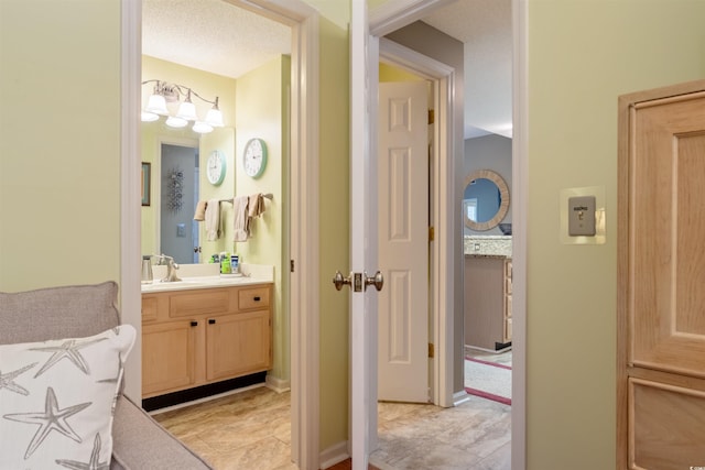 1221 Tidewater Dr Unit 2112, North Myrtle Beach, SC 29582 - bathroom with vanity and a chandelier