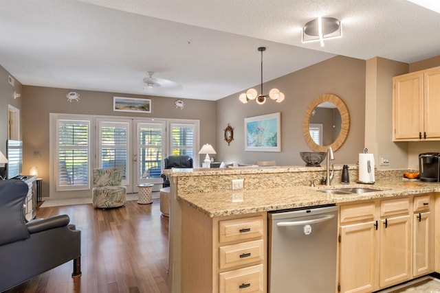 1221 Tidewater Dr Unit 2112, North Myrtle Beach, SC 29582 - kitchen featuring stainless steel dishwasher, open floor plan, a sink, and a peninsula