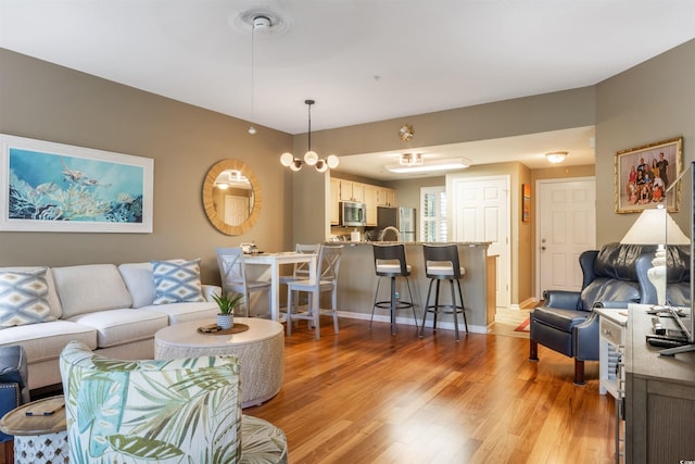 1221 Tidewater Dr Unit 2112, North Myrtle Beach, SC 29582 - living area with light wood finished floors and baseboards