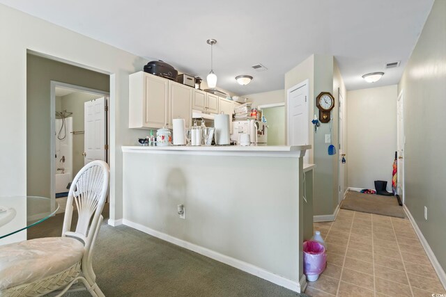 3676 Clay Pond Village Ln Unit 4, Myrtle Beach, SC 29579 - kitchen featuring hanging light fixtures, baseboards, and light countertops