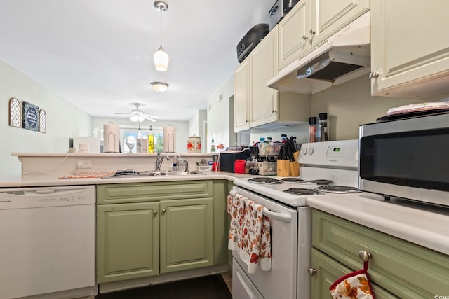 3676 Clay Pond Village Ln Unit 4, Myrtle Beach, SC 29579 - kitchen featuring white appliances, green cabinets, a sink, under cabinet range hood, and light countertops