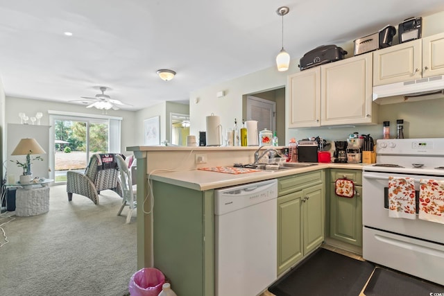 3676 Clay Pond Village Ln Unit 4, Myrtle Beach, SC 29579 - kitchen with white appliances, under cabinet range hood, green cabinets, a peninsula, and a sink