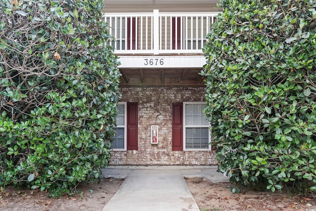 3676 Clay Pond Village Ln Unit 4, Myrtle Beach, SC 29579 - view of exterior entry with brick siding