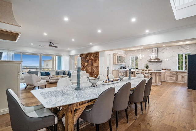 139 Pioneer Loop, Georgetown, SC 29440 - dining space with ornamental molding, recessed lighting, light wood-type flooring, and ceiling fan